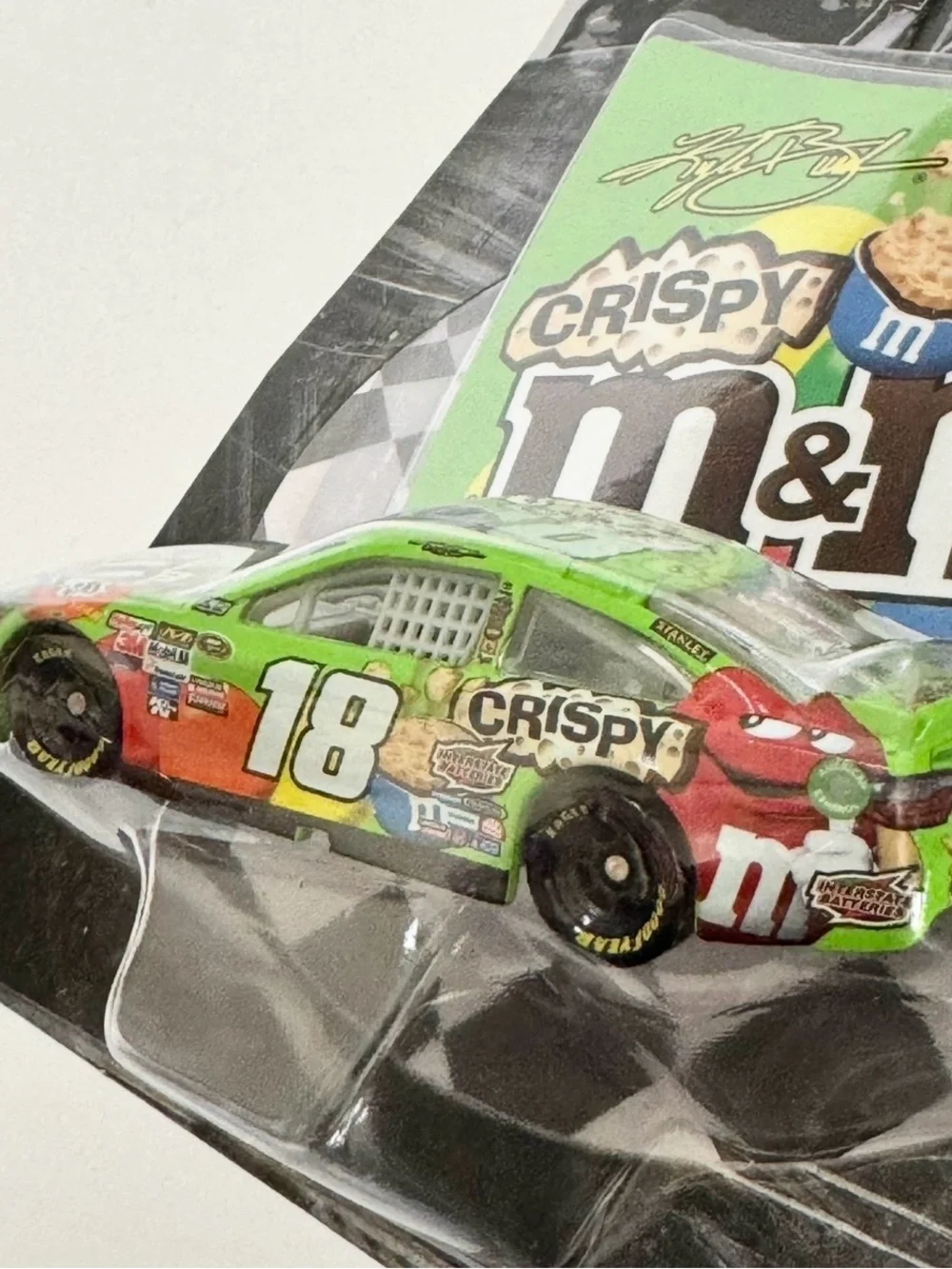 NASCAR Authentics 1:64 scale Kyle Busch #18 Crispy M&M's diecast race car